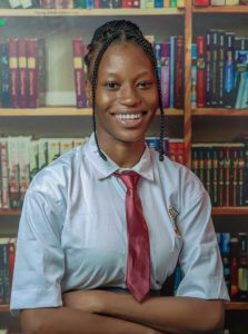 Enthusia College student in uniform in the school library