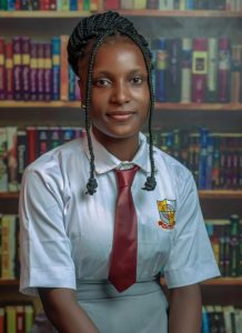 Enthusia College student in uniform in the school library